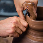 Doug Fitch and Hannah McAndrew making a jug for me